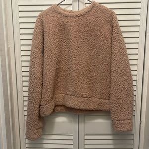 light pink fluffy sweater